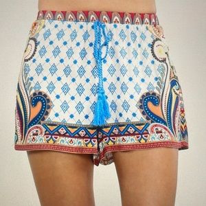 Flying Tomato brand Ivory and blue scarf print tassel tie shorts. Size small